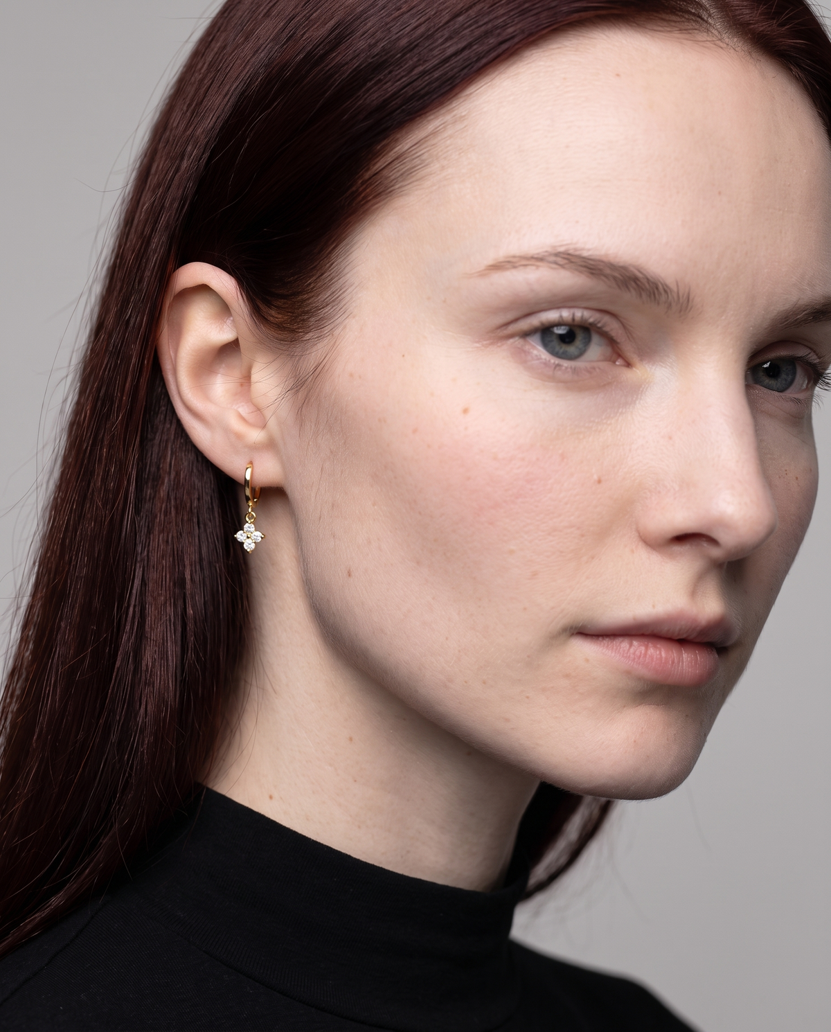 Lucky Clover Earrings in gold finish worn close-up - ARWELY detail on the body