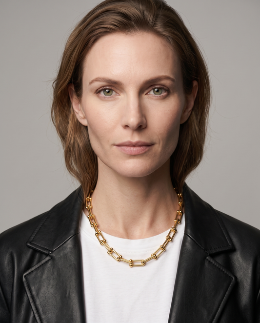 Vera Paperclip Necklace in gold finish worn by a model - ARWELY studio portrait