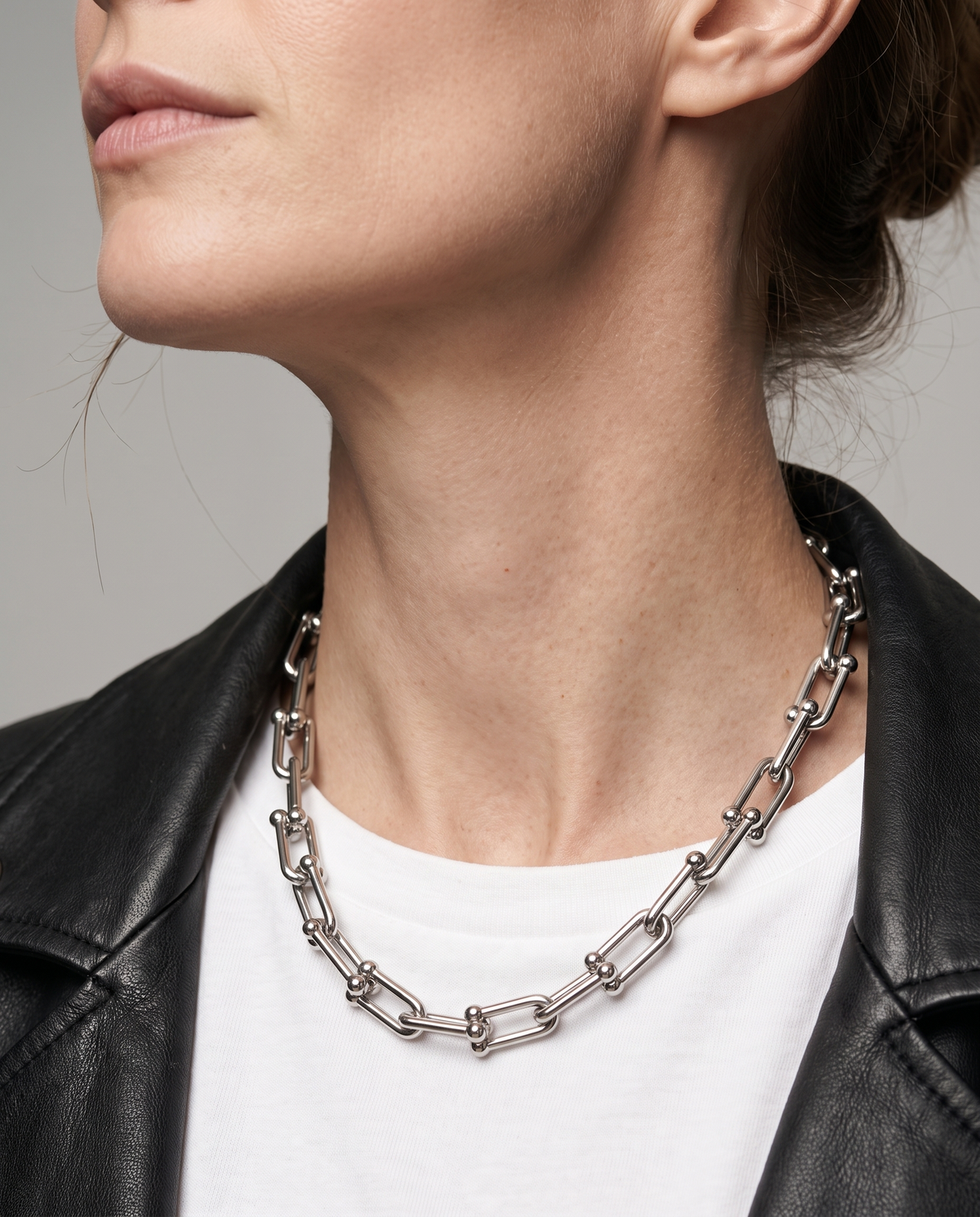 Vera Paperclip Necklace in silver finish worn close-up - ARWELY detail on the body