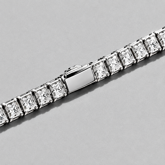 Rivière Tennis Bracelet close up on a diagonal, hard light across the square stones