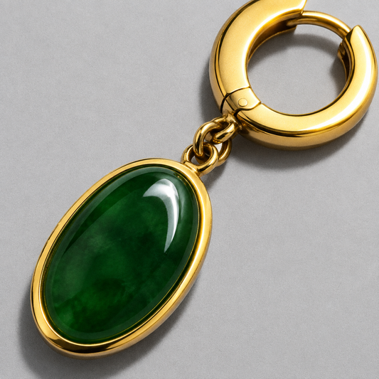 Cléo Drop Earrings detail of the oval green cabochon in a polished gold bezel