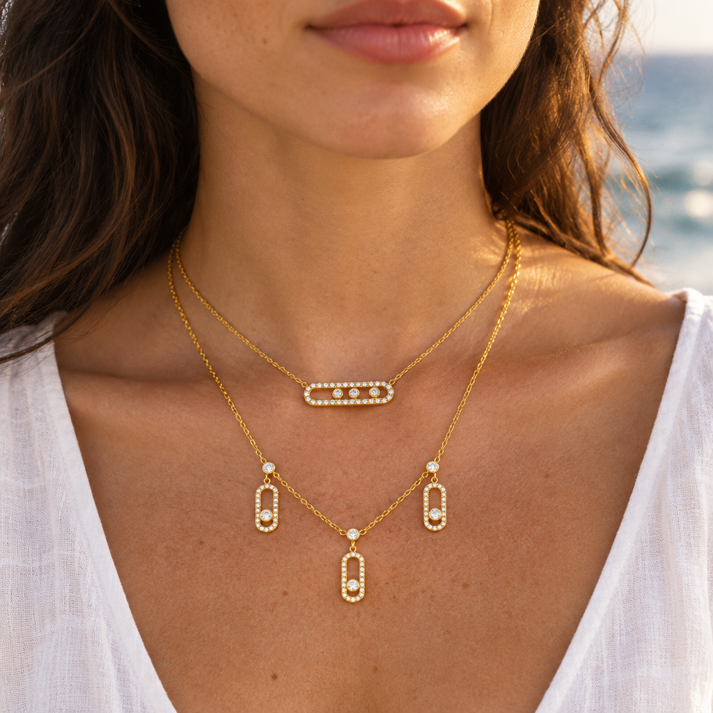 Éclat Bar and Trio worn layered together at the seaside