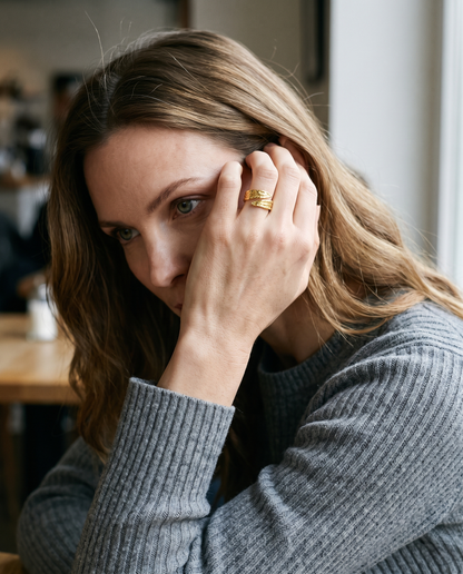 Bold Band Ring in gold finish worn by a model - ARWELY daylight lifestyle photo