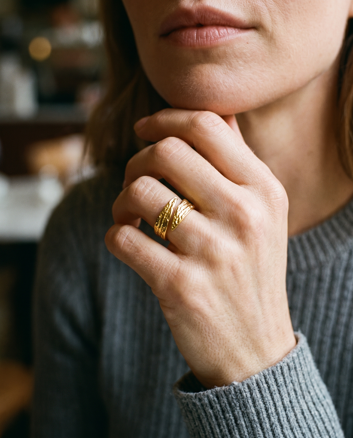 Bold Band Ring in gold finish worn close-up - ARWELY detail on the body