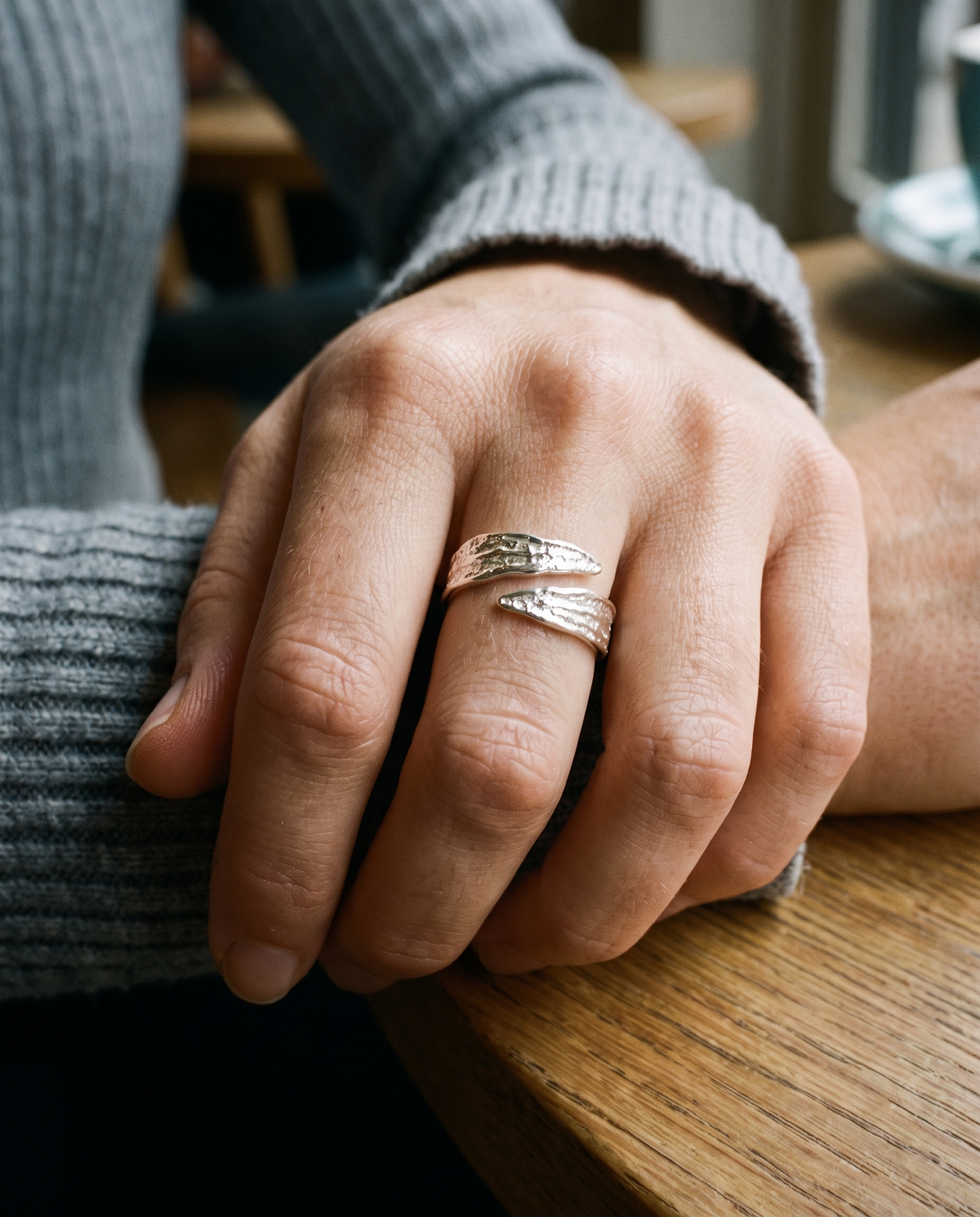 Bold Band Ring in silver finish worn close-up - ARWELY detail on the body