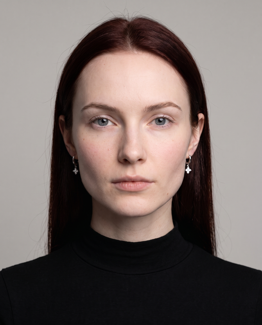 Lucky Clover Earrings in silver finish worn by a model - ARWELY studio portrait