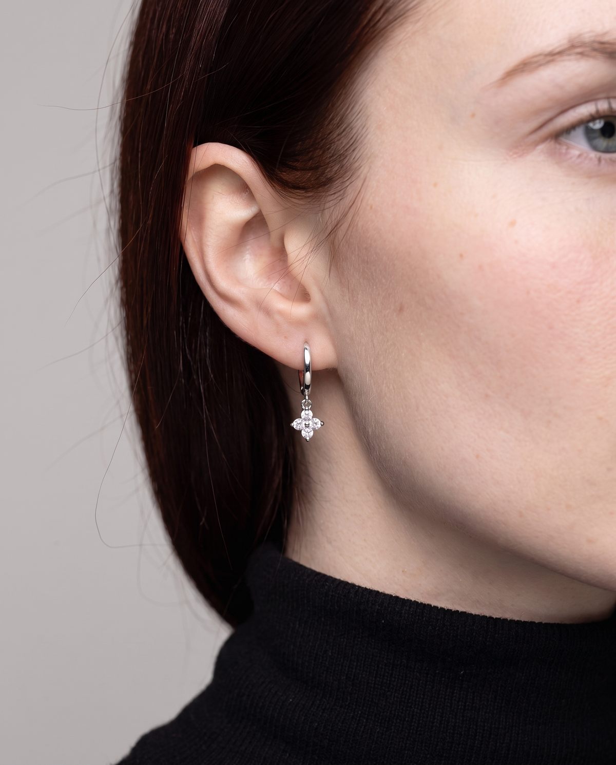 Lucky Clover Earrings in silver finish worn close-up - ARWELY detail on the body