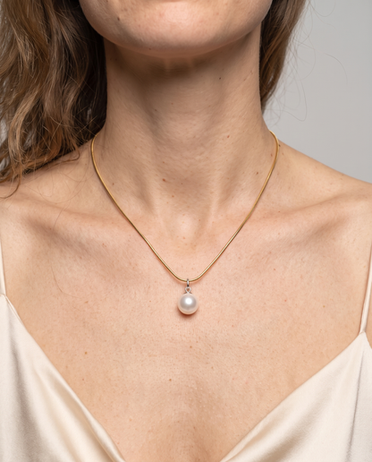Luna Pearl Necklace in gold finish worn close-up - ARWELY detail on the body