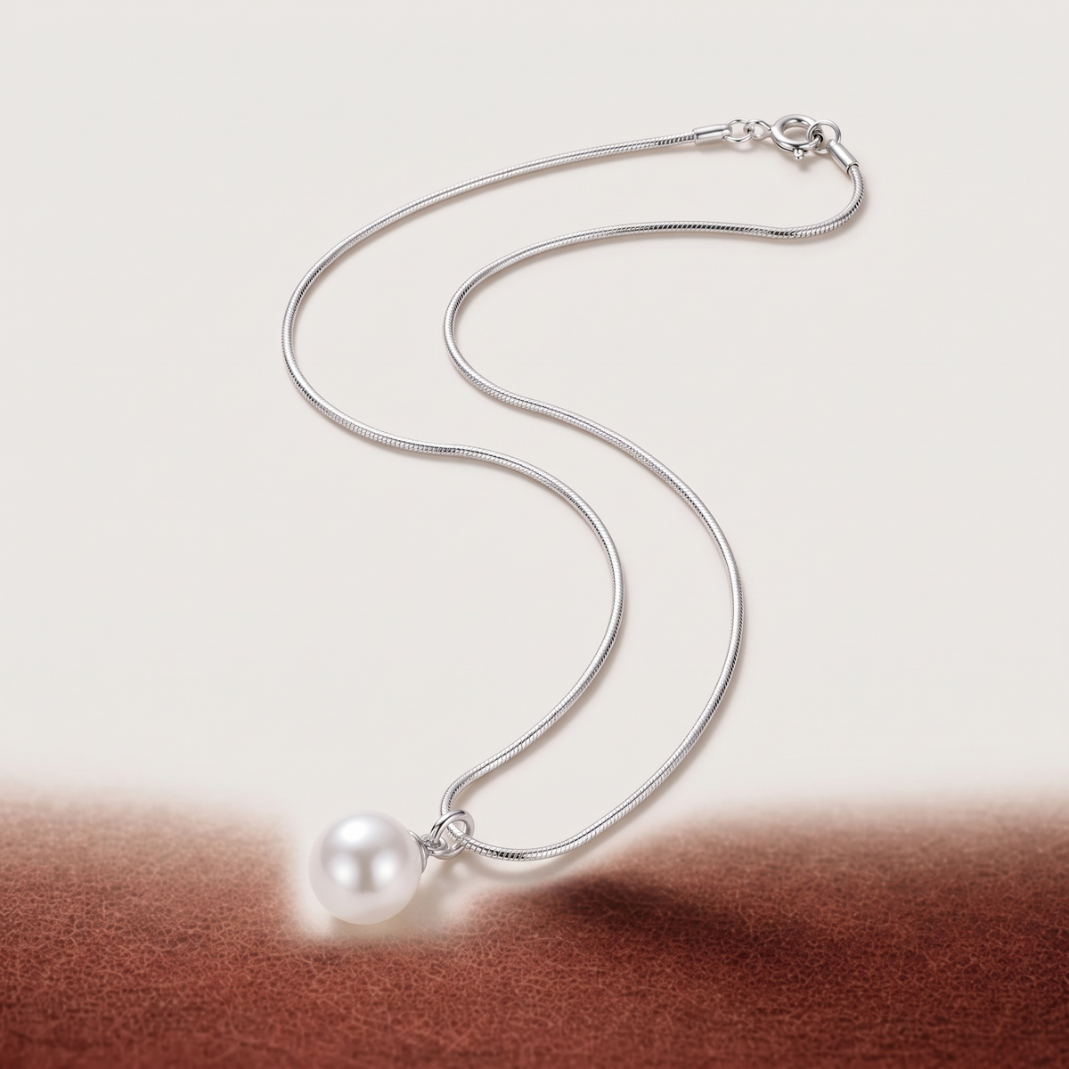 Luna Pearl Necklace in silver finish - ARWELY, full view on a grey studio background
