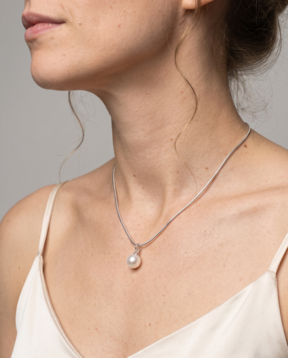 Luna Pearl Necklace in silver finish worn close-up - ARWELY detail on the body