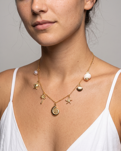 Marina Pearl Necklace in gold finish worn close-up - ARWELY detail on the body