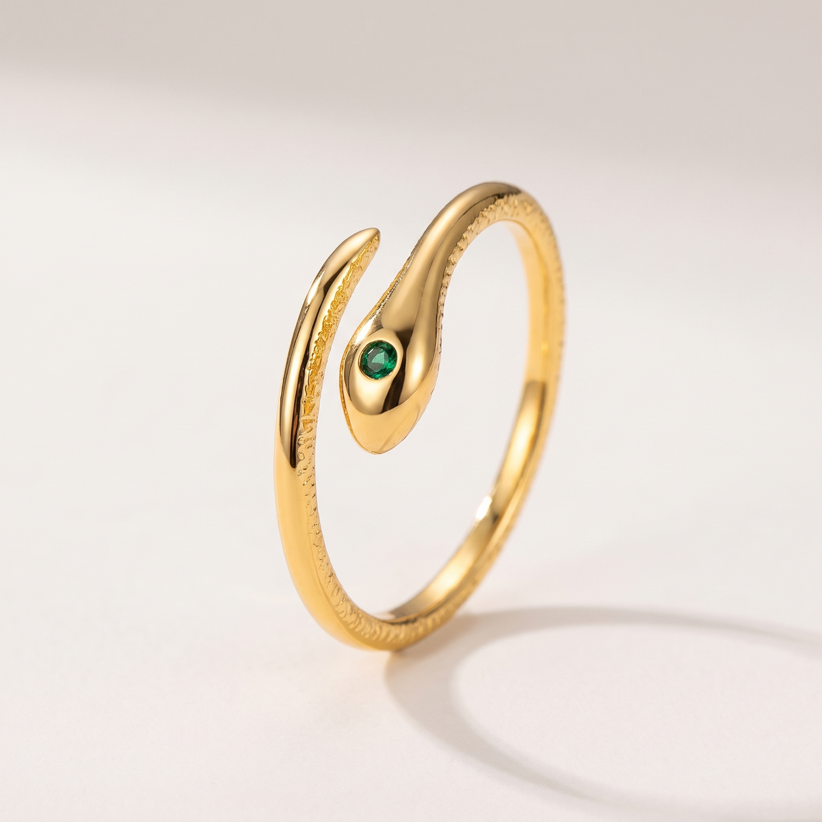 Serpent Ring in gold finish - ARWELY, full view on a grey studio background