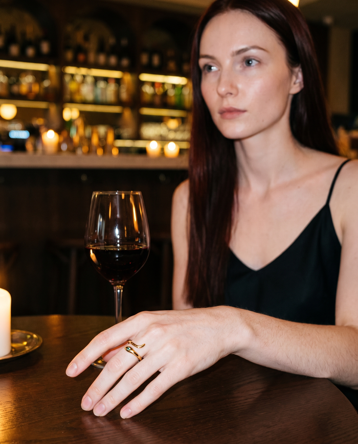 Serpent Ring in gold finish worn by a model - ARWELY daylight lifestyle photo