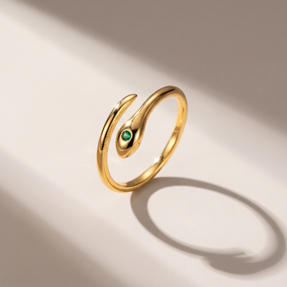 Serpent Ring in gold finish - ARWELY editorial still life with a hard shadow