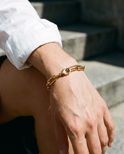 Vera Paperclip Bracelet in gold finish worn close-up - ARWELY detail on the body