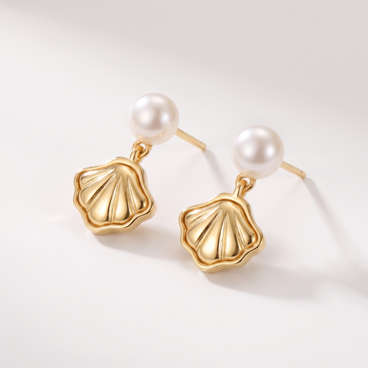 Marée Shell Earrings in gold - ARWELY, gold-finish shell drops with a pearl