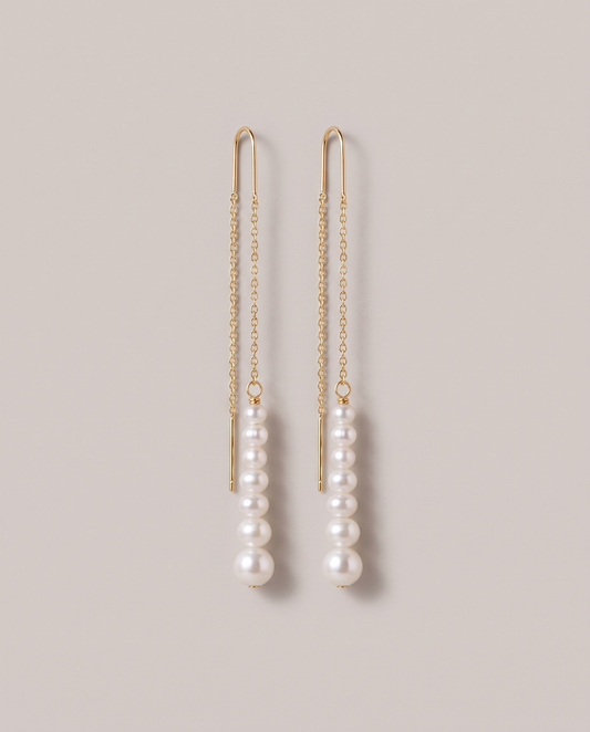 Cascade Pearl Threaders in gold - ARWELY, the pair hanging at full length