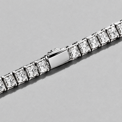 Rivière Tennis Bracelet close up on a diagonal, hard light across the square stones
