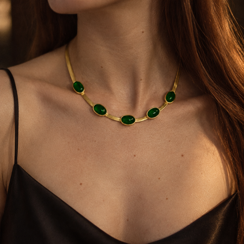 Cléo Necklace worn at the collarbone in warm evening light