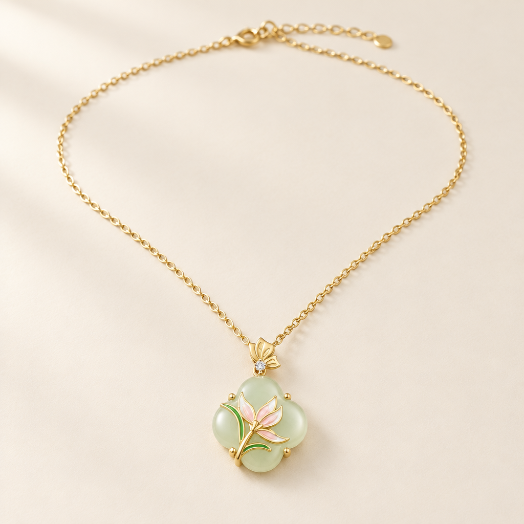 Magnolia Jade Necklace in gold — pale green jade blossom with a pink enamel flower
