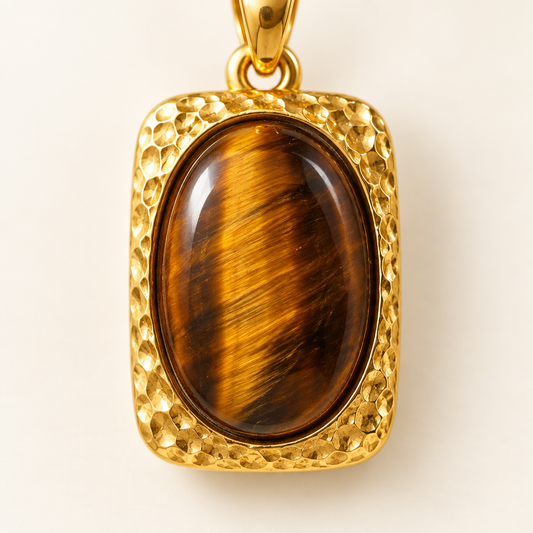 Close detail of the hammered frame and the tiger's eye