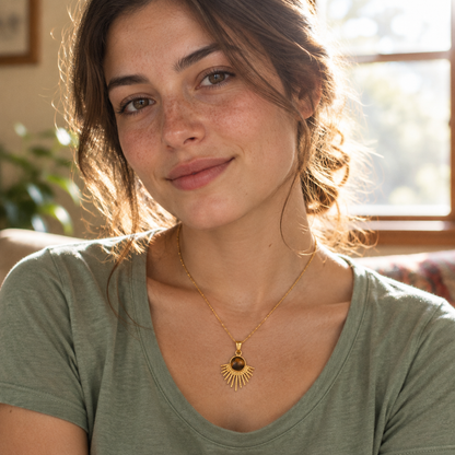 Aurore Pendant Necklace worn by a window