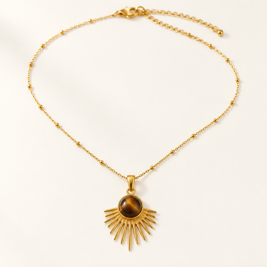 Aurore Pendant Necklace — tiger's eye above a fan of gold rays