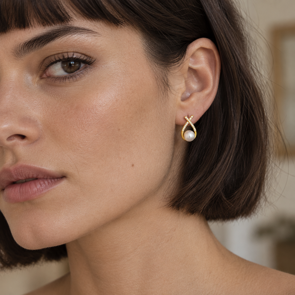 Ruban Pearl Earring worn, close view of the ear