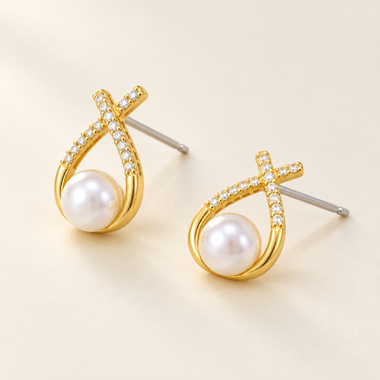 Ruban Pearl Earrings seen at an angle, showing the posts
