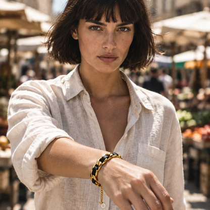 Tandem Leather Bracelet worn walking through a market in midday light