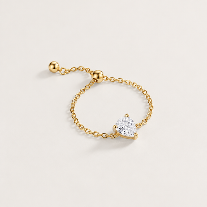 Rosée Drop Ring in gold - ARWELY, pear-cut zirconia on an adjustable chain ring with sliding beads