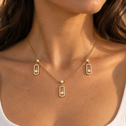 Éclat Trio worn at the collarbone in late afternoon light